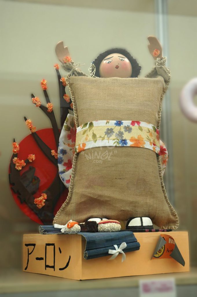 Año 2013, falla Cádiz, Cura Femenía, Puerto Rico, sección undécima Infantil, Artista: La Comisión.